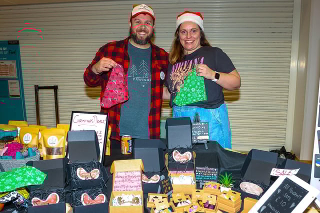 Paul and Pamela of Pawsome Eats prepare to welcome customers.