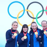 BEIJING, CHINA - FEBRUARY 20: (L-R) Curlers Milli Smith, Hailey Duff, Jennifer Dodds, Vicky Wright and Eve Muirhead of Team Great Britain pose for pictures with their gold medals after winning the  Women's Curling final against Team Japan  at National Aquatics Centre on February 20, 2022 in Beijing, China. (Photo by Lintao Zhang/Getty Images)