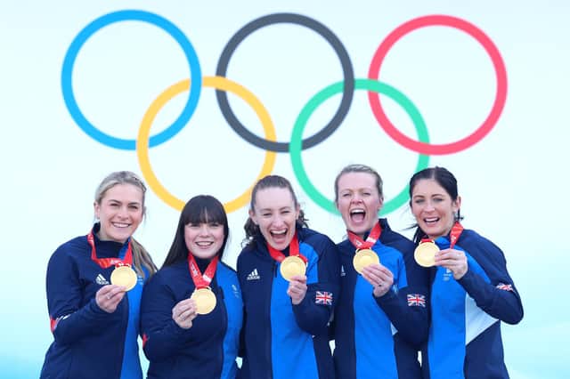 BEIJING, CHINA - FEBRUARY 20: (L-R) Curlers Milli Smith, Hailey Duff, Jennifer Dodds, Vicky Wright and Eve Muirhead of Team Great Britain pose for pictures with their gold medals after winning the  Women's Curling final against Team Japan  at National Aquatics Centre on February 20, 2022 in Beijing, China. (Photo by Lintao Zhang/Getty Images)