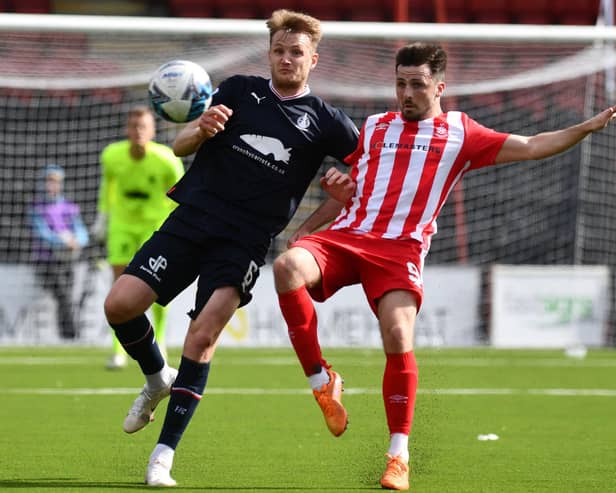 Coll Donaldson (left) is suspended for tonight's game v Queen of the South (Pic Michael Gillen)