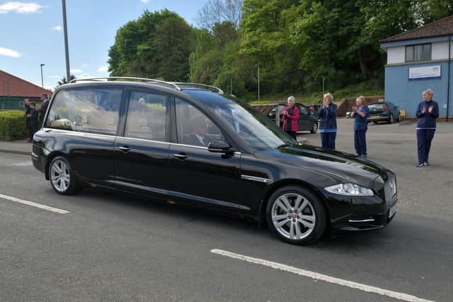 The funeral procession passed the Meadowbank Health Centre for those who were unable to attend the funeral.  Pic: Michael Gillen.