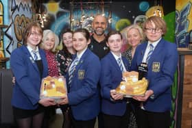 The team behind the Coronation Lemon Eton Mess - Amie Mason, Karen Wright, Niamh King, Catriona Daw, Amrit Dhillon, Alicia Watson,, Elizabeth Kirk and Callum Wakeman - show off their royal creation