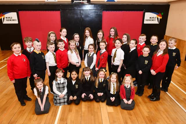 The retinue, including Quen Elect Mirren Anderson from Carronshore Primary, were chosen earlier this year.  Pic: Michael Gillen