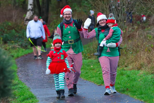 This family took part in Maggie's Forth Valley Elf Run last year - in 2023 it could be you with family and friends. Pic: Scott Louden
