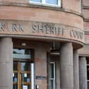 Mackie appeared at Falkirk Sheriff Court (Picture: Michael Gillen, National World)