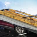 Damage to a car on Burnbank Road parked at Gambero Rosso restaurant after the roof came off nearby hairdresser's Lox. Pic: Lisa Ferguson