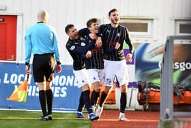 Charlie Telfer celebrates sealing the three points for the Bairns. Images: Michael Gillen