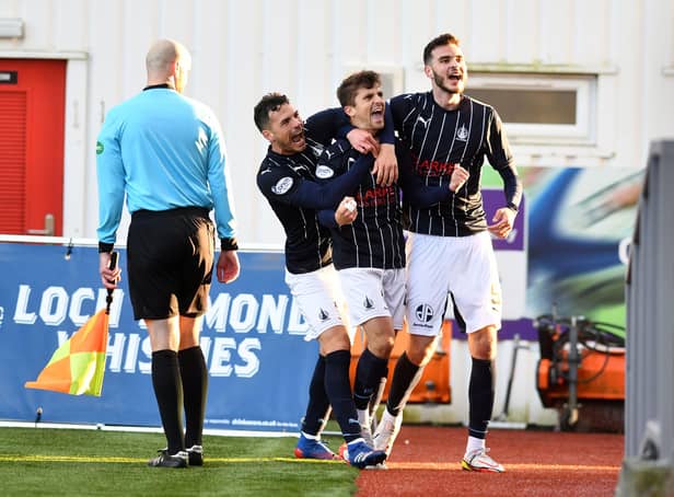 Charlie Telfer celebrates sealing the three points for the Bairns. Images: Michael Gillen