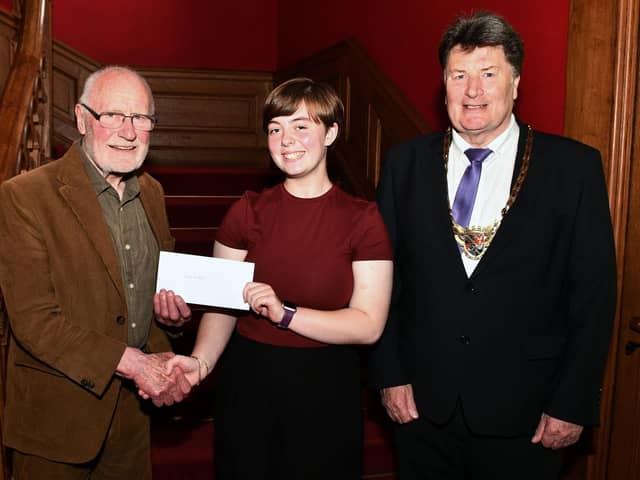 Dennis Canavan with 2024 scholarship winner Gracie Proudlock of Braes High School and Provost Robert Bissett.