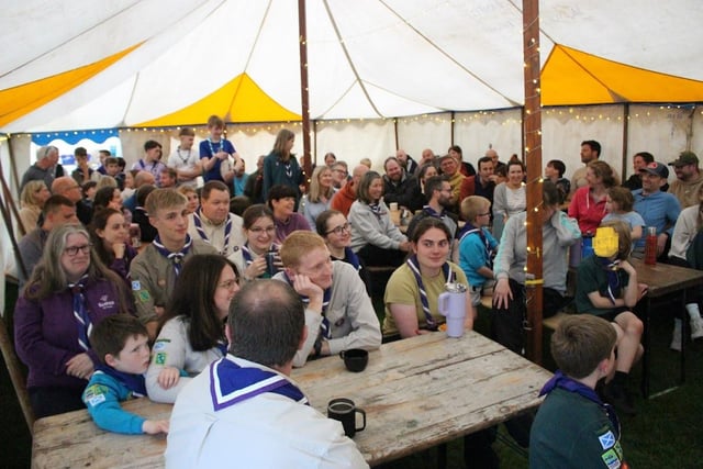 Everyone gathers in the tent on the first evening to hear all about the weekend.