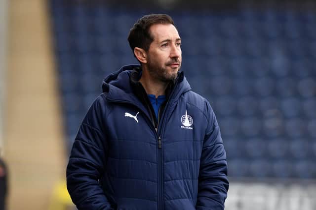 Head coach Martin Rennie on the touchline last weekend against Cove Rangers (Pictures: Michael Gillen)