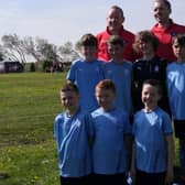 The talented footballers and coaches of Falkirk Community Foundation 2012 seven-a-side squad