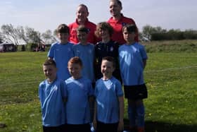 The talented footballers and coaches of Falkirk Community Foundation 2012 seven-a-side squad