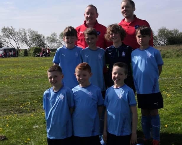 The talented footballers and coaches of Falkirk Community Foundation 2012 seven-a-side squad