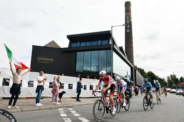 The men's elite road race competitors pass the Rosebank Distillery. Pic: Michael Gillen