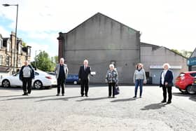 Provost Billy Buchanan and Greenhill Historical Society members began a fundraising campaign to pay for a new Bonnybridge mural on the gable end of the village's Co-op store in 2020. Picture: Michael Gillen.