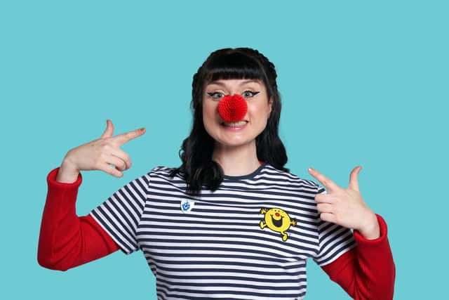 Blue Peter presenter, Abby Cook from Grangemouth, supports Red Nose Day 2023 by wearing the new Red Nose and Mr Men merchandise. Pic: BBC