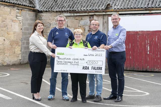 Cheque presentation:  left to right, Asda Falkirk general store manager, Laura Campbell; Bailiefields Community Hub SCIO colleague, Graham Thomson; Asda Falkirk community champion, Margaret Bradie; Bailliefields Community Hub SCIO colleague, Stephen Sutton; and  Asda senior director for Central Scotland, Brian Boyle