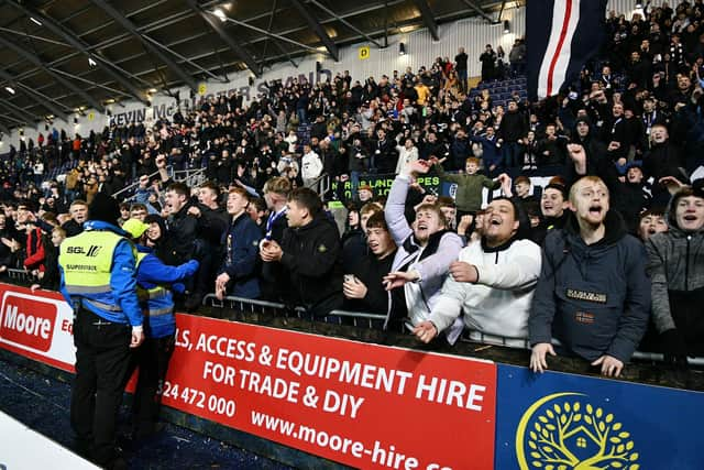 The Falkirk support celebrate after beating Dundee United (Photo: Michael Gillen)