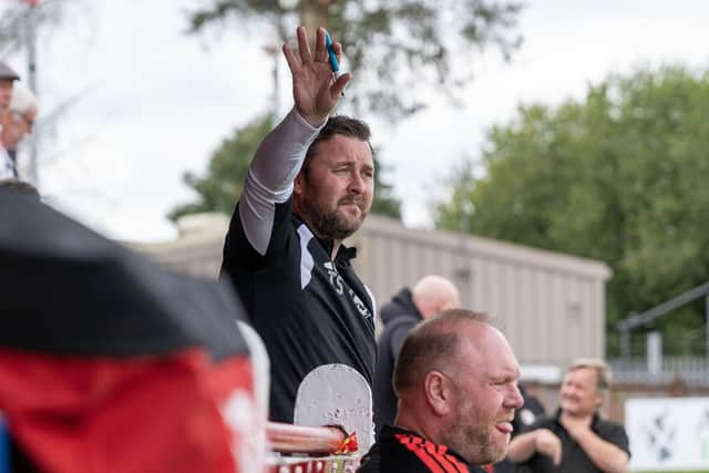 Camelon Juniors boss Tam Scobbie watches on (Stock photo: Michael Gillen)