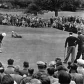 Bobby Locke watches John Panton hole out at the 15th  at Glenbervie.  The man lying down is the referee. Pic: Contributed
