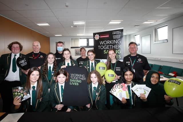 Fire Service volunteers recruiting S6 pupils at St Mungo's High School Falkirk to sign up for Anthonly Nolan Bone Marrow Trust