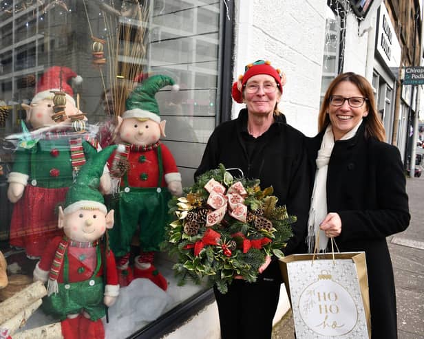 Ann Baff Flowers was the winner of Falkirk Delivers' Christmas shop window competition.  Pictured are Sarah Smith, owner of Ann Baff Flowers, and Deborah Taylor, chairperson of Falkirk Delivers Board.  (Pic: Michael Gillen)