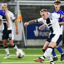 Calvin Miller unleashes a shot at the Queen of the South goal (Pic Michael Gillen)