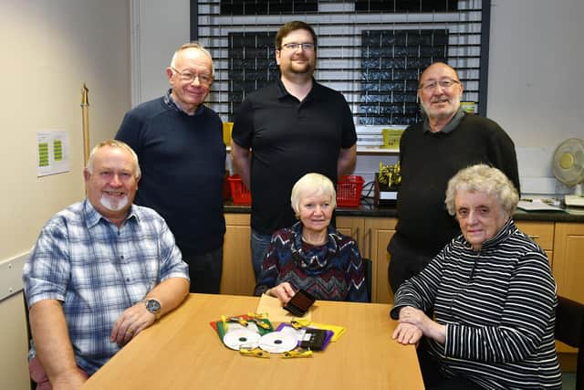 The Newsline committee (front): Peter Trevis, committee member; Christine Moroney, chairwoman; and Elizabeth Sutherland, secretary. (Back): Finlay Nicolson, magazine editor; Duncan McVicar, committee member; and Jim Cairns, treasurer. Picture: Michael Gillen.