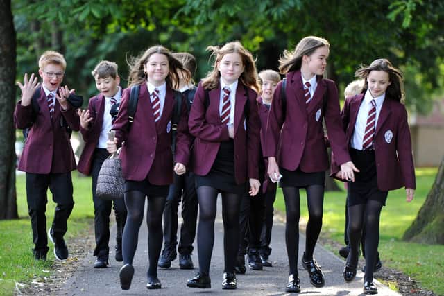 Falkirk High pupils were among those who made their way to school on Wednesday morning for the new academic session. Picture: Michael Gillen.