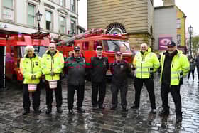 Scottish Fire Brigades Heritage Trust volunteers give shoppers a sight of the service's past with a display of vintage appliances
