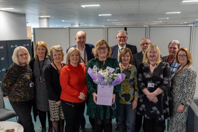 Leona Ferguson, centre, with colleagues including, back left to right, chief executive Kenneth Lawrie, director of children's services Robert Naylor, and head of planning & resources Gary Greenhorn.