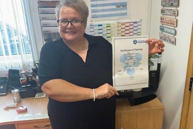 Gillian with her certificate