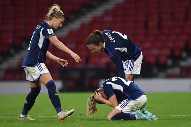 National team stalwarts Nicola Docherty and Rachel Corsie console Erin Cuthbert