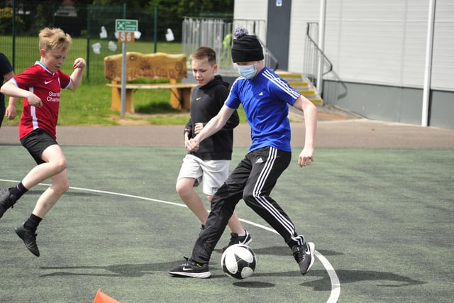 Football is always a favourite pastime at a fun day
