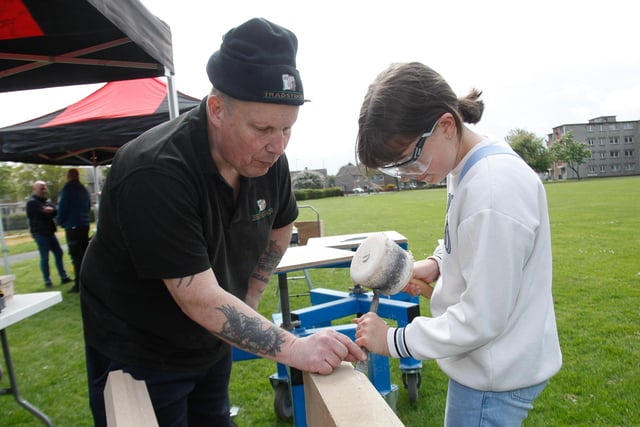 Alan McCleish from Tradstocks (stone supplier to Zetland Park) with Katarina, 12, from Newcarron.