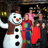 Christmas lights switched on in Grangemouth by Children's Day Queen Emily Ritchie, ten, helped by her Lady in waiting Emily Dunsmore, 10, Provost Pat Reid, the walking Christmas Trees and the cast of Beauty and the Beast.