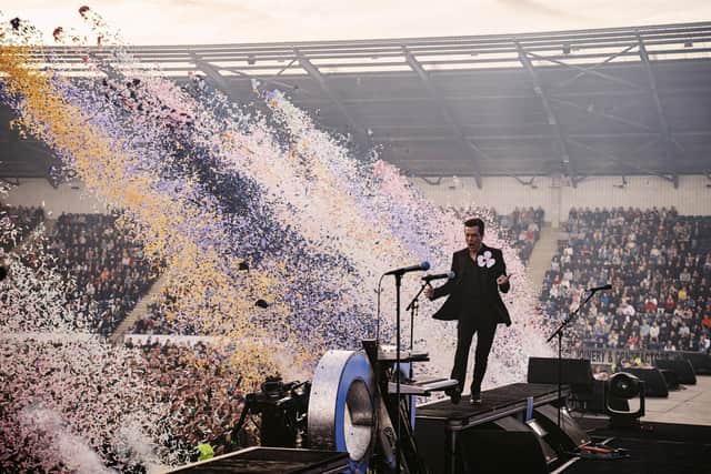 The Killers lead singer Brandon Flowers entertains the Falkirk Stadium Crowd.
