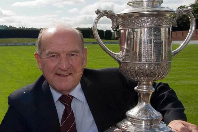 A true legend, Davie Roy became known as Mr Linlithgow Rose, here with the Scottish Junior Cup which the team has won four times. (Pic: Andrew West)