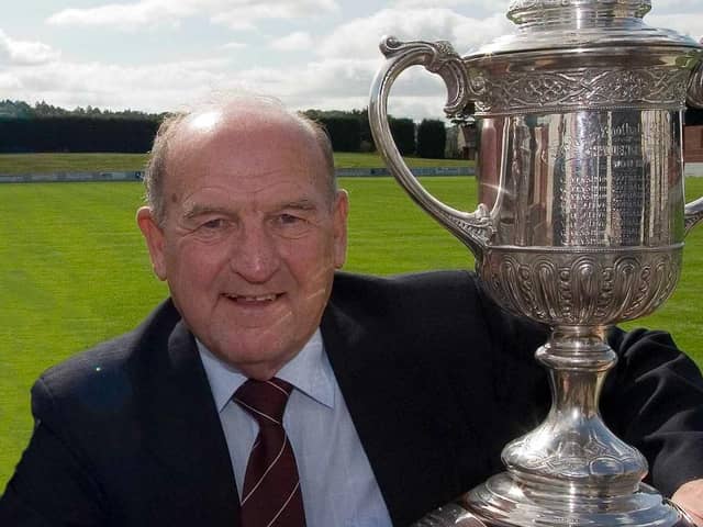 A true legend, Davie Roy became known as Mr Linlithgow Rose, here with the Scottish Junior Cup which the team has won four times. (Pic: Andrew West)