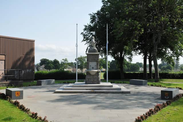 Flags at the Sir John de Graeme memorial fountain in Victoria Park, Falkirk were stolen last Thursday. Picture: Michael Gillen.