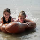 Having fun at the Kelpies are Megan Swiderska 8 and Maja Pulawska 8 from Grangemouth. (Pic: Michael Gillen)