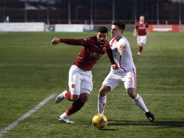 Callum Tapping skips past Brechin's Dave McKay (Photographer: Scott Louden)
