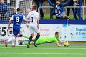 Robbie Mutch saves the first-half penalty from Graham Webster (picture by Michael Gillen)