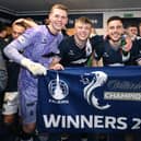 Luke Graham celebrates with team-mates Nicky Hogarth, Ross MacIver and Gary Oliver (Photo: Michael Gillen)