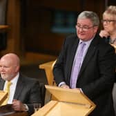 Angus MacDonald MSP in the debating chamber at Holyrood