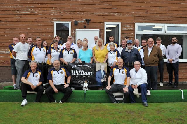 Jean Sneddon (centre blue top) with family and members at Falkirk Bowling Club. (Pic: Michael Gillen)