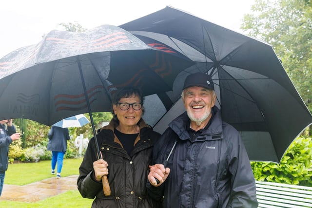 Anne and Tom Miller braved the heavy showers to support the event.