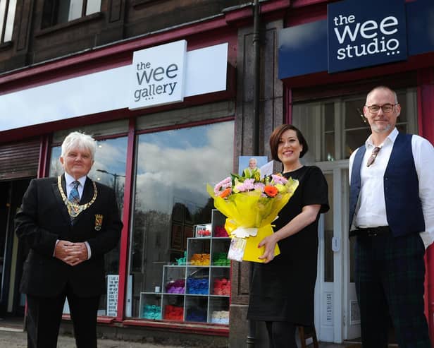 Provost William Buchanan; Lauren Campbell, owner of The Wee Gallery and The Wee Studio and Christo Craig, manager.