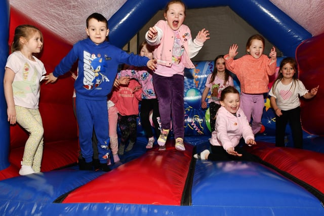 Youngsters in the P2 class enjoying the bouncy castle.